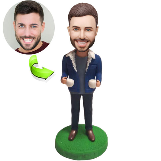 A Custom Bobblehead Doll Of A Man With  Coffee Cups In Both Hands