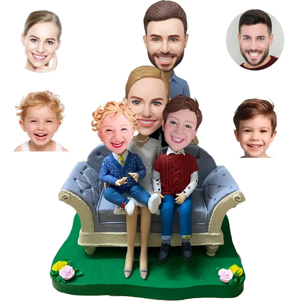 A Family Of Four Bobbleheads Sitting On A Sofa